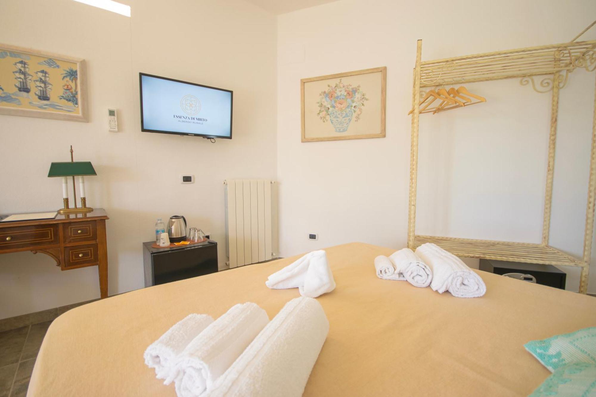 Hotel Essenza Di Mirto Ла-Калетта Номер фото