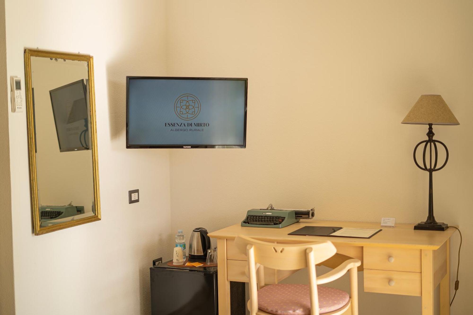 Hotel Essenza Di Mirto Ла-Калетта Номер фото